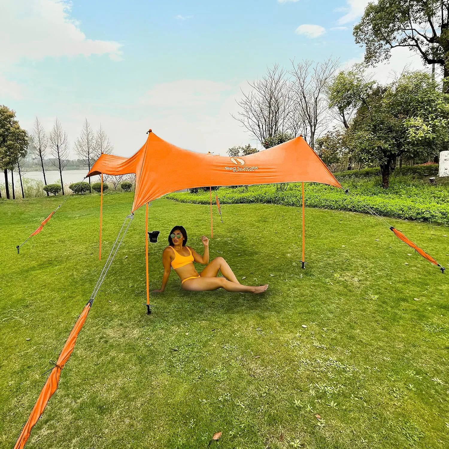 Red Suricata Premium Multi-Terrain Beach Tent & Beach Canopy in Backpack, UPF50 Sun Beach Shade, Pop Up Camping & Picnic Sunshade with 4 Poles, 4 Pole Anchors & 4 Tent Screws, Sun Shelter (Med Orange)